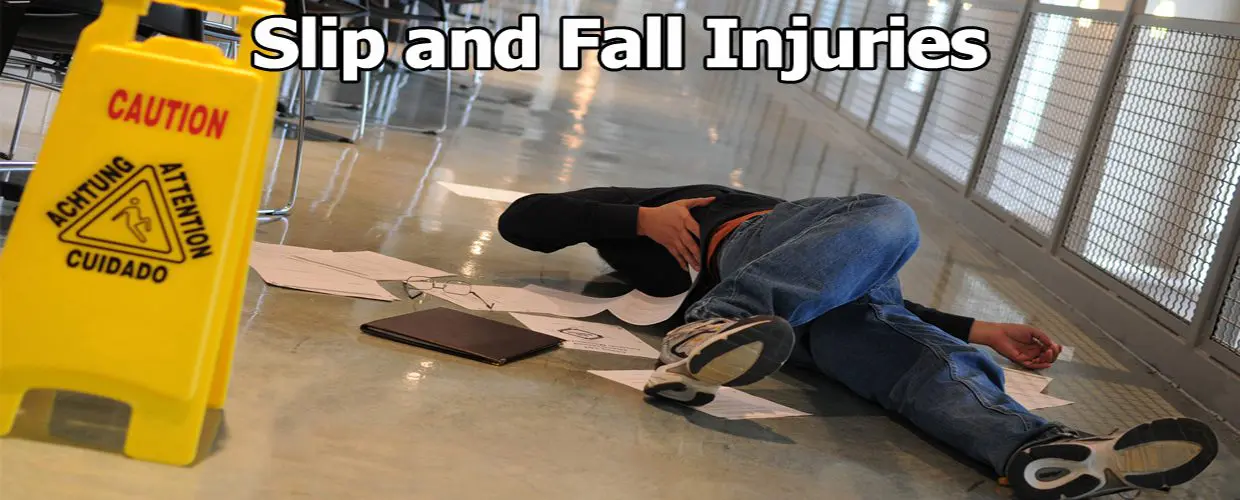 A man laying on the ground with scissors and papers.