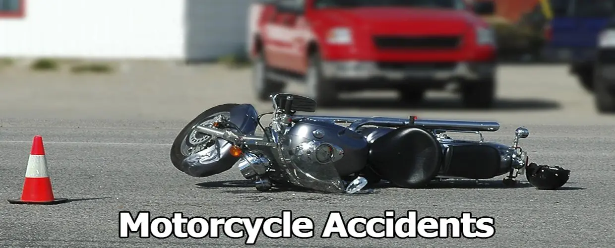 A motorcycle that has been hit by a car.